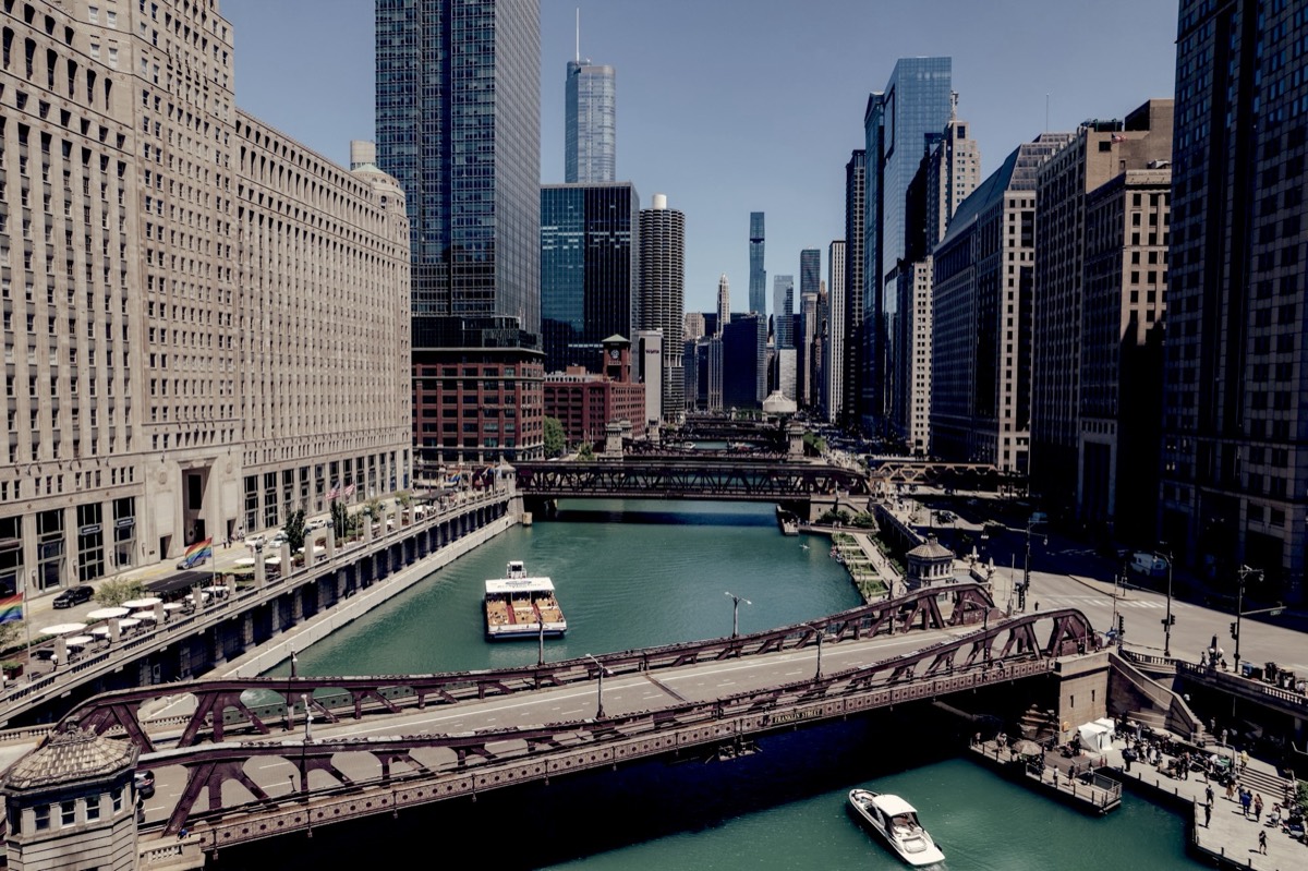 The Chicago River downtown, crossed by a run of bascule bridges between the Merchandise Mart and the skyline